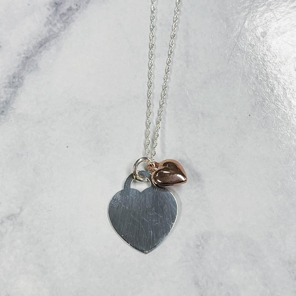 Sterling silver heart pendant with rose gold charm