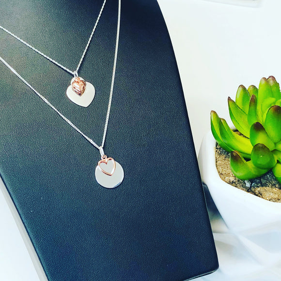 Sterling silver pendant with rose gold charm
